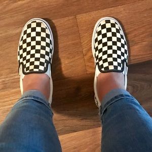 Checkerboard Vans slip ons